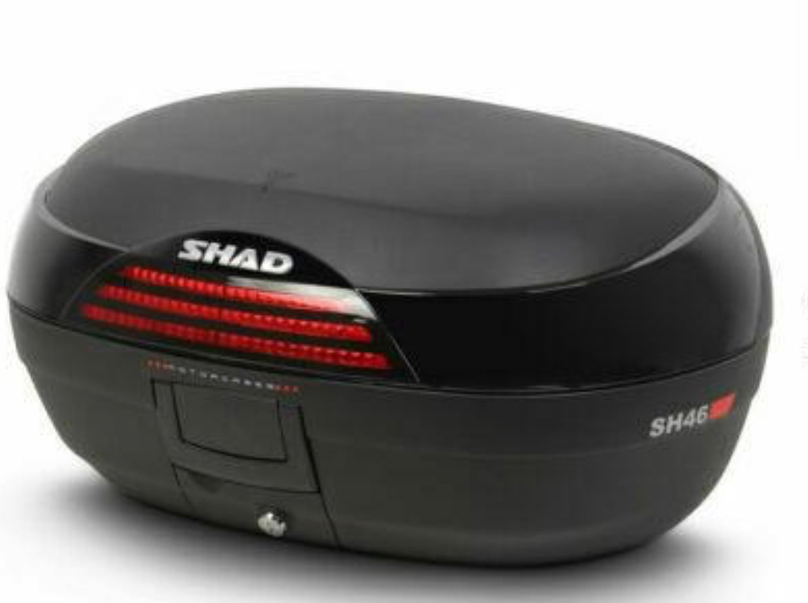 Shad top case with plate